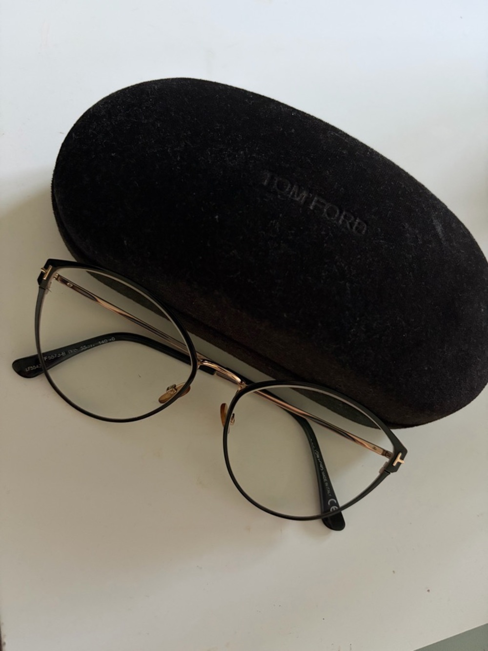 Tom Ford Black and Gold Round Frame Glasses